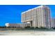 Stunning beachfront resort with balconies and a view of the ocean on a clear day at 9840 Queensway Blvd. # 1819, Myrtle Beach, SC 29572