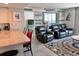 Open floor plan featuring a living room with comfortable seating, light gray walls, and modern decor at 9840 Queensway Blvd. # 1819, Myrtle Beach, SC 29572