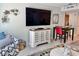 Cozy condo living room with a large television and ample seating at 9840 Queensway Blvd. # 1819, Myrtle Beach, SC 29572