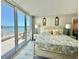 Bright primary bedroom with balcony access and ocean views at 9840 Queensway Blvd. # 1819, Myrtle Beach, SC 29572