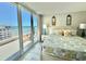 Bright primary bedroom with balcony access and beach views at 9840 Queensway Blvd. # 1819, Myrtle Beach, SC 29572