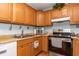 Well-equipped kitchen features wood cabinets, modern appliances, and ample countertop space at 1015 Elm St. # 18, Conway, SC 29526