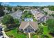 Aerial view of community clubhouse and pool with surrounding residential buildings at 104-4 Gully Branch Ln. # 4, Myrtle Beach, SC 29572