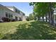 Spacious backyard with lush lawn and direct access to the peaceful lake at 104-4 Gully Branch Ln. # 4, Myrtle Beach, SC 29572
