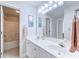 Bathroom with double sink vanity, large mirror, and adjacent shower/tub combination at 104-4 Gully Branch Ln. # 4, Myrtle Beach, SC 29572