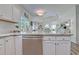 Open-concept kitchen with granite countertops, stainless steel dishwasher and views of the living area at 104-4 Gully Branch Ln. # 4, Myrtle Beach, SC 29572
