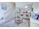 Bright living room with staircase, plush seating, patterned rug and decor at 104-4 Gully Branch Ln. # 4, Myrtle Beach, SC 29572