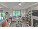 Bright and airy living room with scenic views, cozy seating, and an inviting atmosphere at 104-4 Gully Branch Ln. # 4, Myrtle Beach, SC 29572