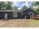 Brick home with a backyard deck and patio, perfect for outdoor entertaining at 106 Azalea Dr., Conway, SC 29526
