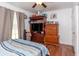 Spacious bedroom with hardwood floors, a ceiling fan, and natural light at 106 Azalea Dr., Conway, SC 29526