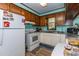 The kitchen has white appliances and light countertops, providing a functional and bright cooking space at 106 Azalea Dr., Conway, SC 29526