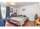 Bright main bedroom with hardwood floors, a ceiling fan, and natural light, creating a tranquil retreat at 106 Azalea Dr., Conway, SC 29526