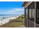 Enjoy oceanfront views from this spacious balcony overlooking the beach and boardwalk at 108 N Ocean Blvd. # 301, North Myrtle Beach, SC 29582