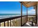 Relax on this spacious balcony overlooking the beach with scenic oceanfront landscapes at 108 N Ocean Blvd. # 301, North Myrtle Beach, SC 29582