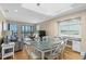 Bright and airy living room featuring ocean views, comfortable seating, and hardwood floors at 108 N Ocean Blvd. # 301, North Myrtle Beach, SC 29582