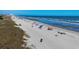 Picturesque aerial view of a sandy beach with people enjoying the sun and sea at 108 N Ocean Blvd. # 308, North Myrtle Beach, SC 29582