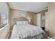 Relaxing guest bedroom features soft light and a large queen bed at 108 N Ocean Blvd. # 308, North Myrtle Beach, SC 29582