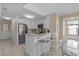 Bright, airy kitchen with white cabinets, granite counters, and stainless steel appliances at 108 N Ocean Blvd. # 308, North Myrtle Beach, SC 29582