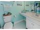 Bright bathroom featuring coastal decor, tiled floors, and vanity at 10970 Highway 90 # A5, Little River, SC 29566