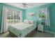 Bright bedroom with coastal decorations, ceiling fan, and lots of light at 10970 Highway 90 # A5, Little River, SC 29566