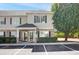 Inviting two-story home featuring a covered entrance and well-maintained landscaping at 10970 Highway 90 # A5, Little River, SC 29566