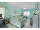 Bright, airy living room with neutral sofas, light wood floors, and coastal decor at 10970 Highway 90 # A5, Little River, SC 29566