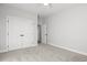 Bright bedroom features carpet, ceiling fan, and a closet with double doors at 1127 Crooked Hook Rd., North Myrtle Beach, SC 29582