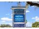 Barefoot Landing waterway sign with restaurant and retail listings under a sunny sky, perfect for shopping and dining at 1127 Crooked Hook Rd., North Myrtle Beach, SC 29582