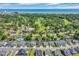 Aerial view of home with views of golf course, the ocean, and lush landscaping, in a desirable community at 1136 Doubloon Dr., North Myrtle Beach, SC 29582
