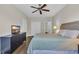 Bedroom with hardwood floors and a dresser with a television at 1136 Doubloon Dr., North Myrtle Beach, SC 29582