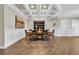 Formal dining room featuring a coffered ceiling, wood floors, and wainscoting, perfect for entertaining guests at 1136 Doubloon Dr., North Myrtle Beach, SC 29582