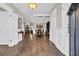 Elegant hallway featuring herringbone wood floors, coffered ceilings, and access to the dining room and living room at 1136 Doubloon Dr., North Myrtle Beach, SC 29582