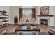 The sunlit living room offers a cozy fireplace, comfortable seating and stylish decor at 1136 Doubloon Dr., North Myrtle Beach, SC 29582