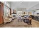 Bright and spacious living room with large windows, fireplace, and a comfortable seating area at 1136 Doubloon Dr., North Myrtle Beach, SC 29582