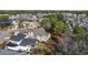 Beautiful aerial view of the property and neighborhood with stunning lake views at 1196 Fiddlehead Way, Myrtle Beach, SC 29579