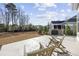 Charming backyard with wooden rocking chairs, ideal for relaxation at 1196 Fiddlehead Way, Myrtle Beach, SC 29579