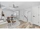 Bonus room featuring hardwood floors, an office area, and a ceiling fan at 1196 Fiddlehead Way, Myrtle Beach, SC 29579