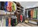 Organized walk-in closet with custom shelving, hanging racks, and ample storage for clothing and accessories at 1196 Fiddlehead Way, Myrtle Beach, SC 29579