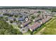 Aerial shot of a residential area with lush greenery and a pond at 138 Butkus Dr. # 2, Myrtle Beach, SC 29588