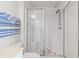 Clean bathroom featuring a glass-enclosed shower with seating and a decorative floor at 138 Butkus Dr. # 2, Myrtle Beach, SC 29588