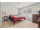 Bedroom featuring a window, ceiling fan, bed with quilt, and side tables at 138 Butkus Dr. # 2, Myrtle Beach, SC 29588