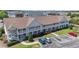 An inviting exterior of a two-story condo with charming balconies and well-maintained landscaping at 138 Butkus Dr. # 2, Myrtle Beach, SC 29588