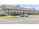 Building exterior featuring two-story units with balconies and well-maintained landscaping at 138 Butkus Dr. # 2, Myrtle Beach, SC 29588