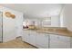 A clean, functional kitchen featuring white cabinets, a practical countertop, and an efficient layout at 138 Butkus Dr. # 2, Myrtle Beach, SC 29588