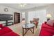 Cozy living room with bright natural light, ceiling fan and comfortable seating arrangement at 138 Butkus Dr. # 2, Myrtle Beach, SC 29588