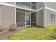 Cozy screened-in porch with chairs and view to yard at 138 Butkus Dr. # 2, Myrtle Beach, SC 29588