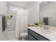 Well-lit bathroom featuring a shower-tub combo, vanity with sink, and sleek fixtures at 141 Ranch Haven Dr., Murrells Inlet, SC 29576