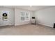 Bedroom with neutral walls, carpet floors, and a bright window at 141 Ranch Haven Dr., Murrells Inlet, SC 29576