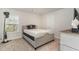 Bedroom with natural light and a stylish upholstered headboard at 141 Ranch Haven Dr., Murrells Inlet, SC 29576