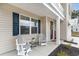 Inviting front porch with comfortable seating, perfect for enjoying the outdoors at 141 Ranch Haven Dr., Murrells Inlet, SC 29576